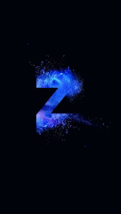 the letter z is made up of blue and purple powder on a black background with stars