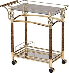 a gold and glass bar cart with wheels