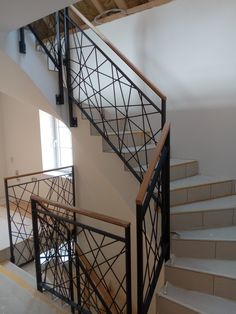 the stairs are made of metal and wood