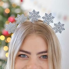 Metal Silver Snowflake Christmas Headband Christmas Headband Christmas Fun Christmas Party Accessories Christmas Dress Up New Year Party This glittering silver snowflake headband is the perfect holiday accessory for your Christmas celebration outfit. Wrap up your Christmas look with this silver metal headband that will sparkle in the tree lights. Further, it is timeless; you may keep wearing it and using it year after year. Each pack contains: 1 x Snowflake headband designed for adults. Snowflake Headband, Christmas Party Accessories, Christmas Headbands, Halloween Photo Booth, Christmas Dress Up, Christmas Photo Props, Ginger Ray, Metal Headband, Halloween Tableware