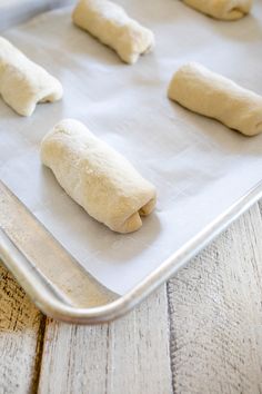 dough rolls on a baking sheet ready to go into the oven