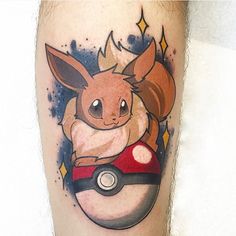 a pokemon tattoo on the leg of a man