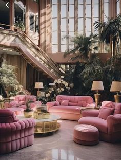 a living room filled with lots of pink couches and chairs next to an escalator