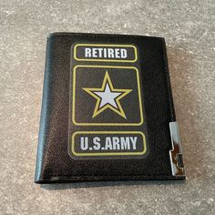 a black leather wallet with a star on the front and u s army written on it