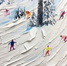 many skiers are skiing down a snowy hill