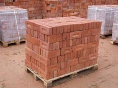 some red bricks stacked on top of each other