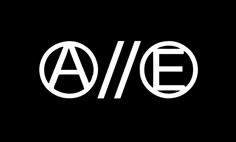 the word ae is written in white on a black background, with an oval logo