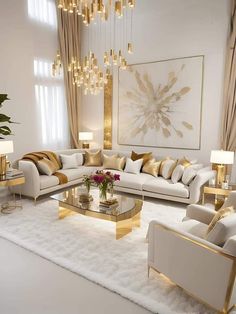 a living room filled with white couches and gold accents