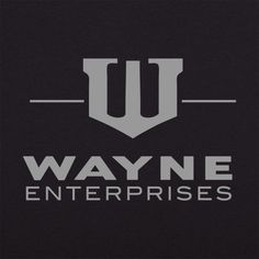 the wayne enterprises logo is shown on a black background with white letters and an arrow