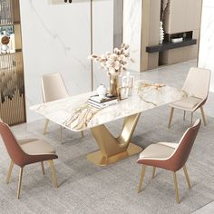 a marble dining table with four chairs around it