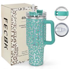 the teal leopard print travel mug is next to its box