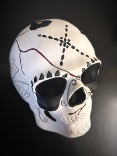 Immerse yourself in the rich symbolism of the Day of the Dead with our elaborately designed skull mask. Every detail is meticulously crafted to honor the beauty of life and remembrance. The contrasting colors of black and white evoke a timeless and dramatic flair, making this mask the perfect accessory for any Day of the Dead celebration.


Age Group/Gender - Adult/Men

Size/Type - One size fits all adults

Mask Color - White/Black

Mask Material - Polyresin Day Of The Dead Mask, Couples Masquerade Masks, Mens Masquerade Mask, The Day Of The Dead, Day Of The Dead Skull, Female Mask, Masquerade Masks, Men's Day, Skull Mask