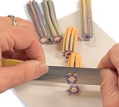 Jenny Patterson slices extruded flower canes after they are fired on PolymerClayDaily Cold Cut, Clay Extruder, Polymer Art, Clay Canes, Clay Clay, Polymer Clay Cane, Kaleidoscopes, Polymer Clay Canes