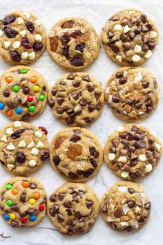 chocolate chip cookies with m & m's and white chocolate chips in the middle