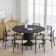 a dining table with six chairs around it