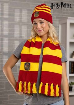 a woman wearing a harry potter scarf and hat