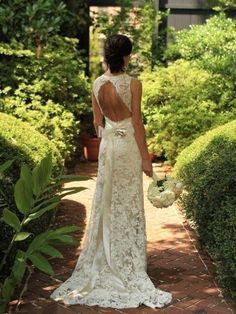 the back of a woman's wedding dress