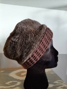 Adorable vintage brown faux mens or womans winter beanie hat. Perfect shape for age Has a crochet brown band at base of hat. No manufacturer noted. 21 1/2 inches around base but very stretchy. Brown Fleece-lined Cap, Brown Cap With Fleece Lining, Winter Brimmed Bonnet, Adjustable Brown Hat With Fleece Lining, Winter Brimmed Fitted Bonnet, Fitted Brimmed Winter Bonnet, Brown Winter Bonnet One Size, Winter Brown Bonnet, One Size Fits Most, Fitted Winter Bonnet Cap