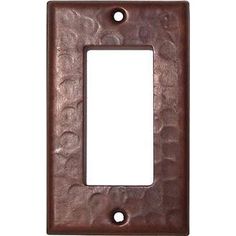 a single light switch cover in brown leather