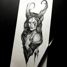 a drawing of a woman with horns on her head