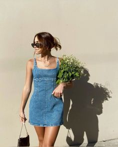 Check out some denim dress selections inspired by this spring time chic look. Jean Dress Aesthetic, Jean Dress Outfit Summer, Demin On Demin Outfits, Denim Dress Aesthetic, Short Denim Dress Outfit, Denim Mini Dress Outfit, Demin Dress Outfit, Denim Dress Summer Outfit, Denim Outfit Aesthetic