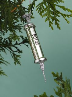 Add a touch of humor and uniqueness to your Christmas tree with the Botox Syringe ornament, a playful reminder of the year's events and a conversation starter for your holiday gatherings. Makes the perfect Christmas gift! Med Spa Christmas Decor, Medical Office Christmas Decor, Beauty Ornaments, Spa Christmas Tree, Esthetician Christmas Decor, Esthetician Christmas Quotes, Botox Christmas Tree, White Elephant Gift, Holiday Botox Quotes