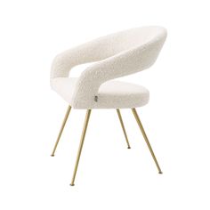 a white chair with gold legs on a white background