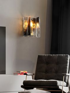 lluminate your home in style with the unique Blason wall lamp. Mounted on a brass fixture, clear glass plates with capture and refract light to create dramatic patterns on surrounding surfaces. What does it mean to set of 2?It simply means that there are two lights, each with the separate quantity indicated, in the order & packaged together. If you have any questions about our products, please contact us and we will reply to you within 24 hours. Product Size Size: Dia 22cm x H 23cm / ∅ 8.7″ x H Modern Luxury Living Room, Clear Glass Plates, Brass Wall Lamp, Lampe Decoration, Brass Fixtures, Glass Wall Lights, Brass Lighting, Gold Glass, Lamp Decor