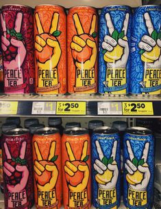 several cans of peace tea on display in a store