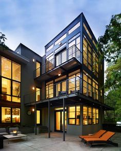 a large modern house with lots of windows