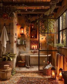 a bath room with a tub a rug and candles