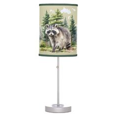 a lamp with a raccoon on it