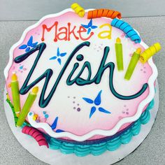 a birthday cake with the words make a wish on it