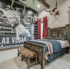 a bedroom with a large mural on the wall