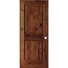 a wooden door with two round knobs on the front and side panels, in dark wood