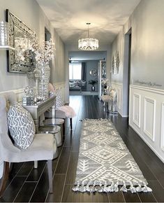 an instagram photo of a living room and hallway