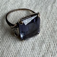 Vintage 14k Yellow Gold 10 Ct. Lab Alexandrite Ring Blue To Purple Size 4.25. Scissor cut stone, unmarked, acid tested. 14mm x 12mm x 7mm. 2 round diamonds, 1mm each. Excellent condition. Please see all photos closely as they are part of the listing description. Thank you for looking. (Ted) Antique Jewelry Rings, Scissor Cut, Alexandrite Ring, Ring Blue, Blue Rings, Cocktail Rings, Vintage Watches, Antique Jewelry, Round Diamonds