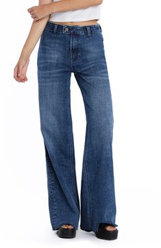 Tailored with an easy-fitting wide leg, these stretch-denim jeans feature a flat front and two back patch pockets. 32" inseam; 23" leg opening; 10 1/4" front rise Zip fly with button closure Back patch pockets 69% cotton, 27% REPREVE® recycled polyester, 3% rayon, 1% spandex REPREVE recycled polyester is made from 100% post-consumer recycled plastic bottles Machine wash, tumble dry Imported High Rise Flare Jeans In Medium Wash For Work, Wide-leg Jeans For Work In Medium Wash, Wide Leg Dark Wash Flare Jeans, Medium Wash Wide-leg Flare Jeans For Work, Dark Wash Denim Wide Leg Pants With Five Pockets, Wide Leg Medium Wash Jeans For Work, Washed Blue Wide Leg Flare Jeans With Five Pockets, Medium Wash Wide-leg Denim Flare Jeans, Medium Wash Mid-rise Wide Leg Pants With Five Pockets