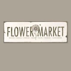 a sign that says flower market on it