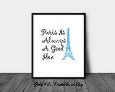 the paris is always a good idea in blue and black on a white background with an eiffel tower