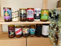 an assortment of different types of condiments on a shelf