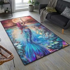 a living room area rug with a mermaid painting on it