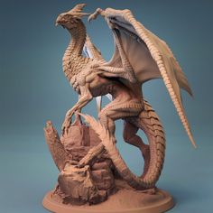 a statue of a dragon on top of a rock