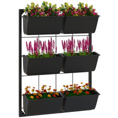 three tiered planter with flowers and plants growing in it on a white background