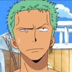 an anime character with green hair staring at the camera