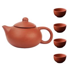 a tea set with four cups in front of it and five on the side, all made out of clay