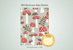 an image of a cross stitch baby blanket with mushrooms on it