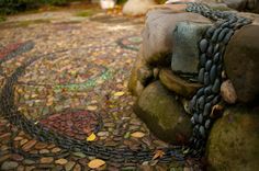 there is a chain on top of some rocks