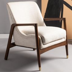 Immerse yourself in the beauty of Scandinavian design with this Flannery Mid-Century Accent Chair. Generously upholstered in a decadent cream linen blend, Flannerys sleek angles and subtle curves are crafted with sustainable teak wood in a rich, dark mahogany finish. Designers love its brass-capped front legs. FeaturesFull Dimensions: 27.2" x 29.5" x 32.3"Fill Material: Foam/PaddingCrafted of Wood/Fabric/MetalWeight Capacity: 275Seat Dimensions: 19"X21.5"X18"Made In: IndonesiaDue to lighting and Shoe Storage Furniture, Mid Century Accent Chair, Arizona House, Accent Chair Set, Dark Mahogany, Outdoor Ottomans, Glider Chair, Home Theater Seating, Wood Care