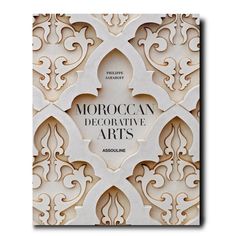 the cover of moroccan decorative arts magazine, featuring an intricate pattern and ornate carvings on white paper